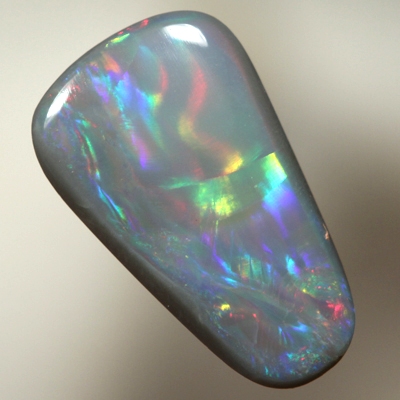 SOLID SEMI BLACK OPAL Rolling flashes of multicolours